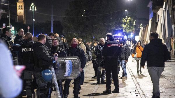 Fan and police officer stabbed in clashes before Champions League match in Milan