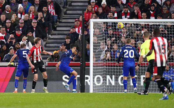 Brentford's Nathan Collins scores their side's third goal of the game. Brentford's Nathan Collins scores their side's third goal of the game.
