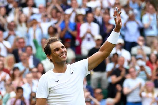 FILE PHOTO: Tennis - Wimbledon - All England Lawn Tennis and Croquet Club, London, UK - July 6, 2022. Spain's Rafael Nadal celebrates winning his quarter final match against Taylor Fritz of the US. REUTERS/Hannah Mckay/File Photo
