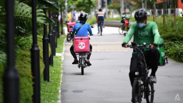 Higher costs to protect platform workers 'part and parcel' of doing business, says Koh Poh Koon as law passes