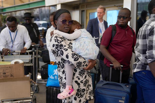 Stranded passengers wait for their delayed flights out of JKIA airport