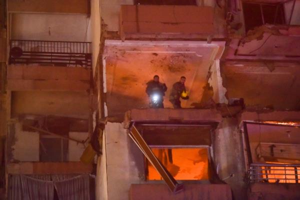 The strike hit the upper floor of an apartment building