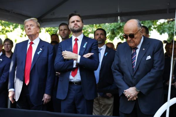 Trump, Republican vice presidential nominee, U.S. Sen. J.D. Vance (R-OH) and former New York City Mayor Rudy Giuliani join family and friends at Ground Zero honoring the lives of those lost on the 23rd anniversary of the terror attacks of September 11, 2001, at the World Trade Center on September 11, 2024 in New York City.