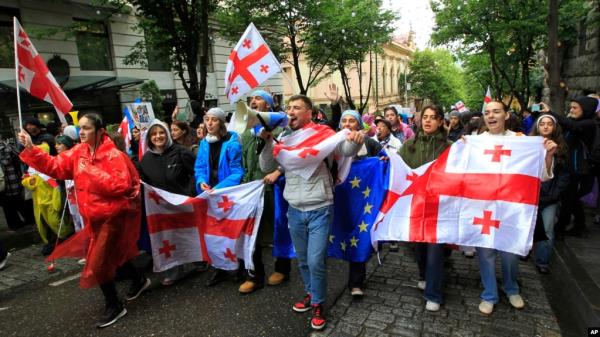 FILe - Demonstrators rally against the "foreign influence" bill in Tbilisi, Georgia, May 14, 2024. Because of the law, the U.S. announced on July 31, 2024, that it would withhold $95 million in assistance to the country. 