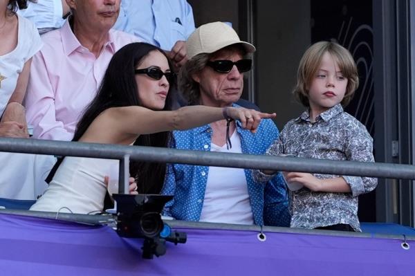 Melanie Hamrick and Mick Jagger with their son at the 2024 Paris Olympics