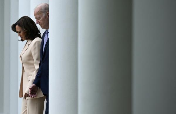 Vice President Kamala Harris and US President Joe Biden arrive to deliver remarks during National Small Business Week, in the Rose Garden of the White House in Washington, DC, on May 1, 2023.