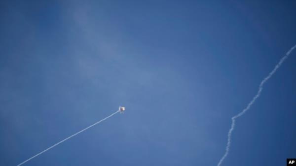 Israeli Iron Dome air defense system fires to intercept a rocket fired from Lebanon, in northern Israel, Sept. 20, 2024.
