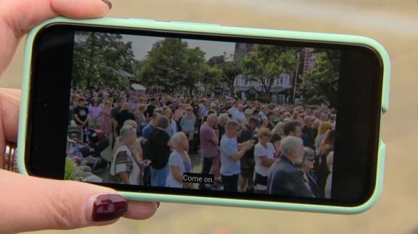 A scene from the vigil filmed by Jacqui McDonald