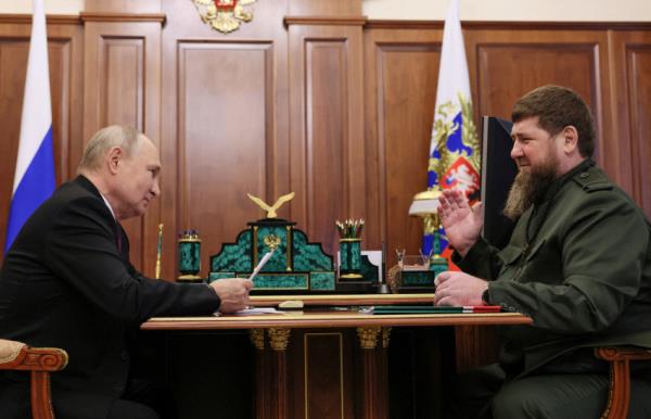 FILE PHOTO: Russian President Putin and Chechen leader Kadyrov meet in Moscow