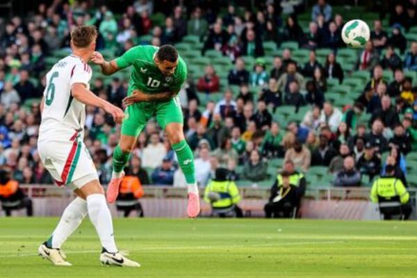 HUNGARY SCALP: Ireland's Adam Idah scores the opener. Pic: Ben Brady, Inpho