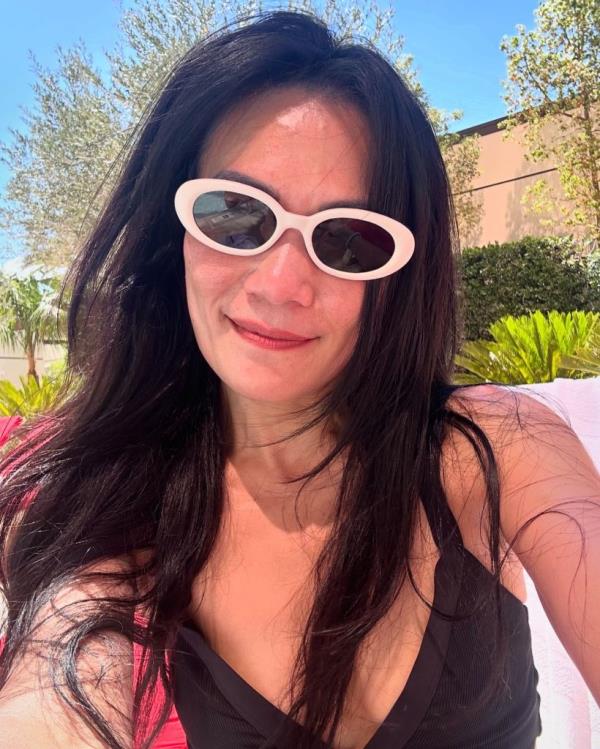 Top Chef star Shirley Chung wearing sunglasses and smiling, during her chemotherapy treatment for stage 4 tongue cancer