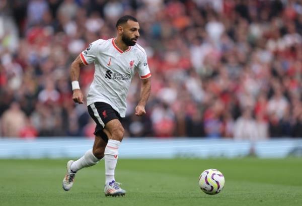Mohamed Salah pictured wearing Liverpool's new third kit with the Nike logo upside down