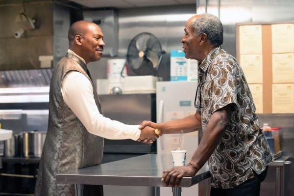 Eddie Murphy and John Amos in "Coming 2 America" (2021).
