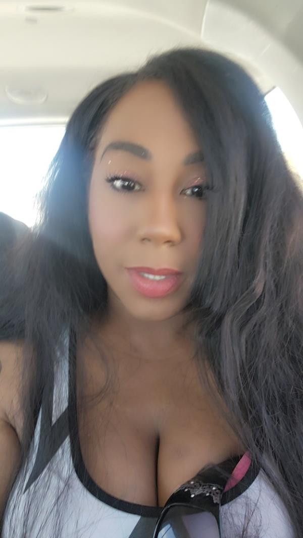 a selfie of English, taken in a car