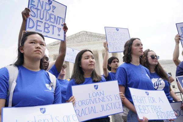 People demonstrate outside the Supreme Court, Friday, June 30, 2023