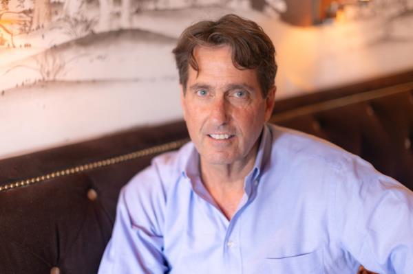 Curtis Bashaw, Republican candidate for NJ US Senate, sitting on a couch in the Brown Room of Congress Hall in Cape May, New Jersey