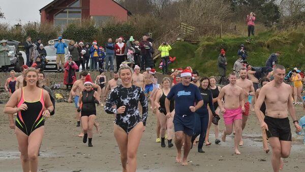 In Pictures: Thousands take to sea for Christmas Day swims in support of good causes