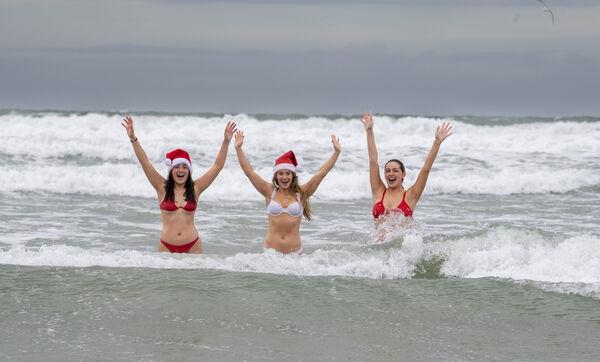 Sinead O'Mahony , Ciara McCarthy and Sally O'Mahony from Tralee at the Christmas Day Swim at Banna Beach Co Kerry. Picture: Domnick Walsh/Eye Focus LTD Sinead O'Mahony , Ciara McCarthy and Sally O'Mahony from Tralee at the Christmas Day Swim at Banna Beach Co Kerry. Picture: Domnick Walsh/Eye Focus LTD