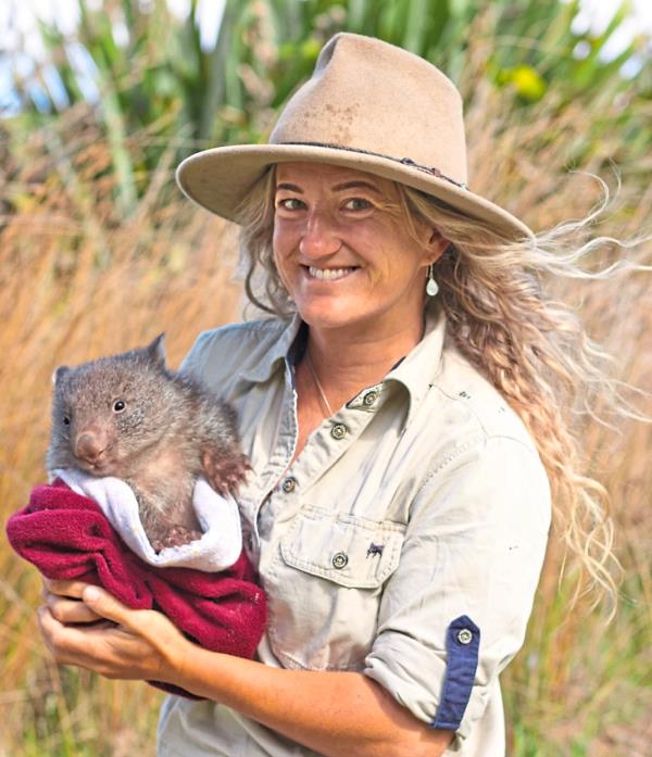 George the wombat cuddled by Natureworld’s wildlife manager Natalie Hill. — East Coast Natureworld Tasmania