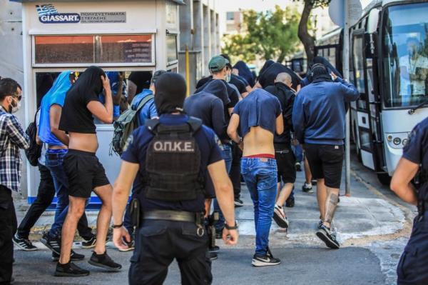 Over 100 to face Greek prosecutor over deadly football fan violence