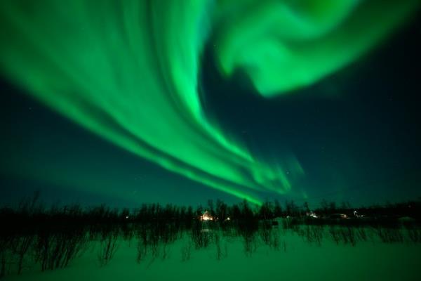 The Aurora Borealis, commonly known as the Northern Lights, are seen in the sky above Kiruna on March 7, 2024 in Kiruna, Sweden.