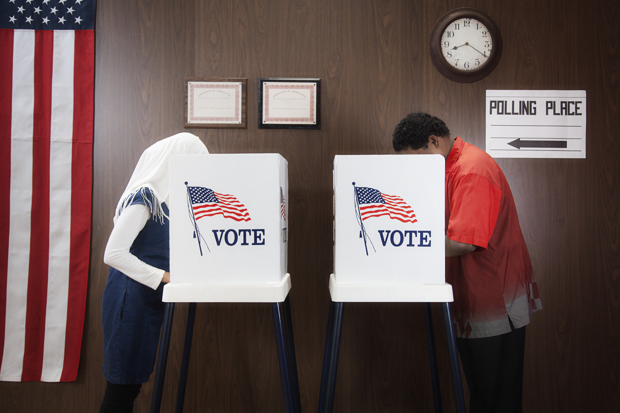 Voting booths in a polling place for the 2024 US election.
