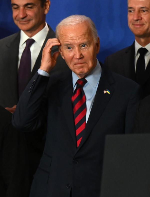 President Joe Biden looks on during a group photo at an event concerning the recovery and reconstruction of Ukrainian at the United Nations on September 25, 2024 in New York, New York.