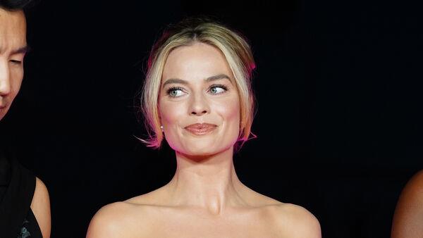 Margot Robbie loses voice at her first premiere since US actors’ strike