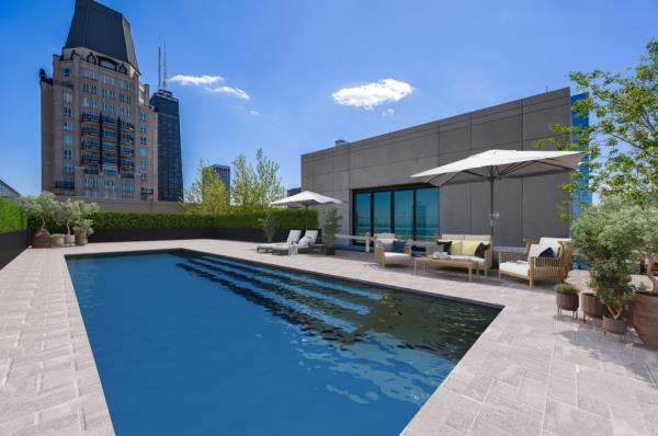 The rooftop pool at his penthouse in Chicago.