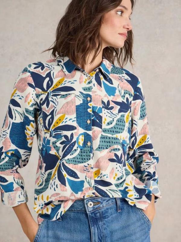 woman wearing white stuff organic cotton shirt