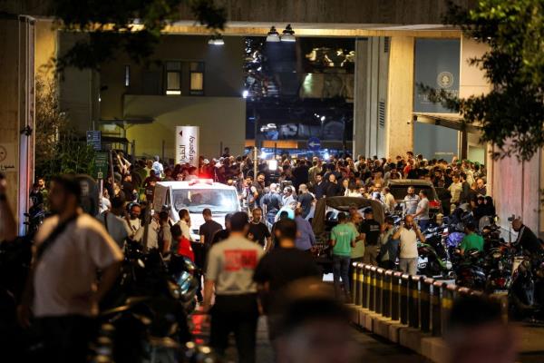 People gather outside American University of Beirut Medical Center as more than 1,000 people were wounded when the pagers they use to communicate exploded in Beirut, Lebanon, on September 17.