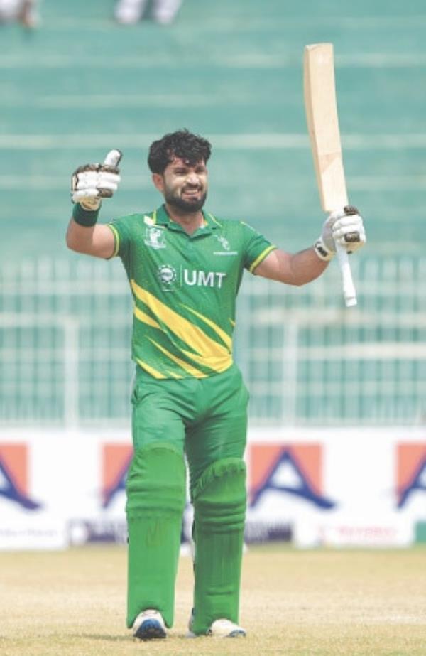 MARKHORS batter Kamran Ghulam celebrates scoring a century during the Champions One-day Cup match against Dolphins at the Iqbal Stadium on Wednesday. —courtesy PCB