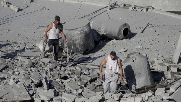 Israeli strikes kill multiple civilians at shelters in Gaza combat zone
