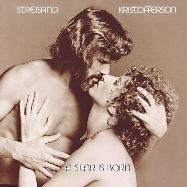 Barbra Streisand and Kris Kristofferson on their 1976 'A Star Is Born' album cover, sharing a kiss.