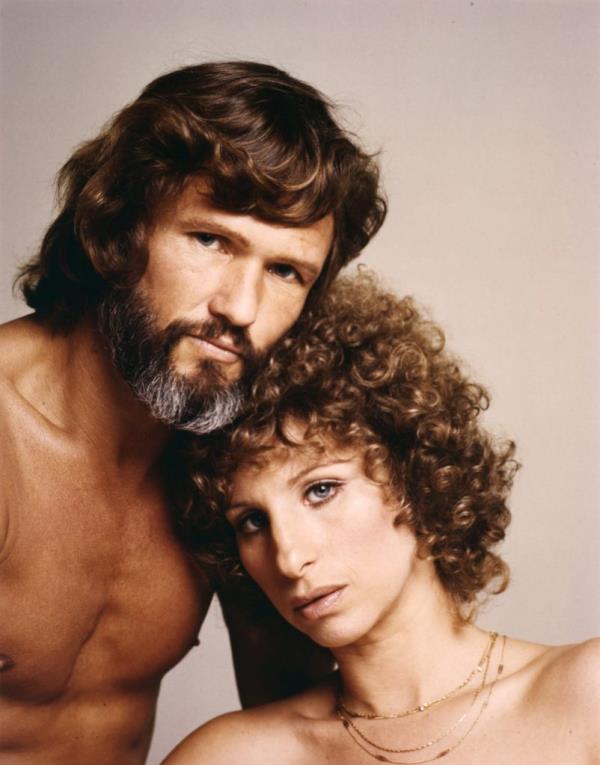 Kris Kristofferson and Barbra Streisand posing on the set of 'A Star is Born'.