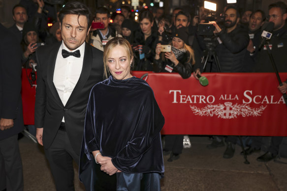 Giorgia Meloni, and her now former partner Andrea Giambruno, photographed together in December 2022.