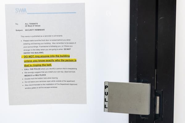 Building management posted signs inside, advising residents to take precaution.