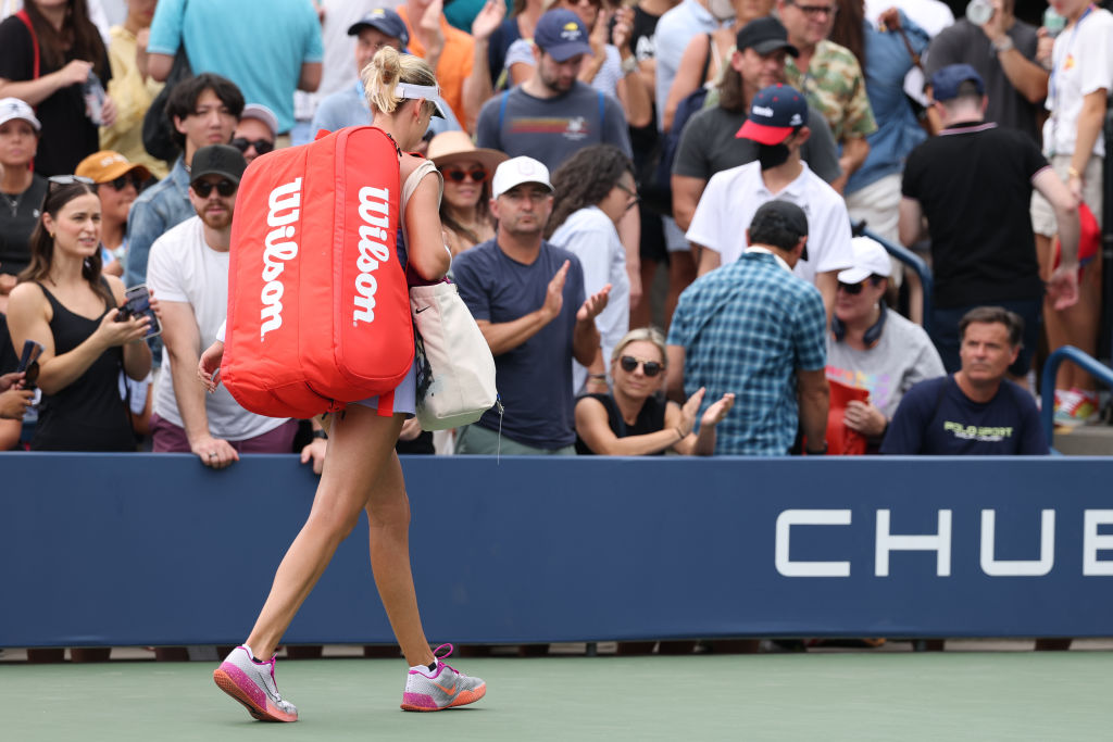 Katie Boulter of Great Britain leaves the court after being defeated by Jessica Bouzas Maneiro