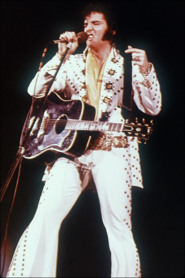 Elvis Presley performing.