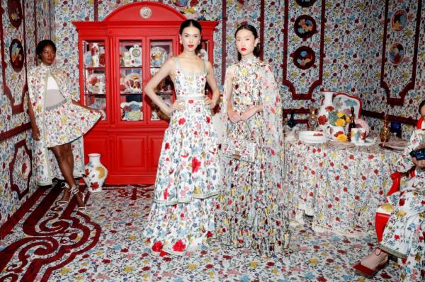 Models, including Ronni Hawk, posing at the alice + olivia by Stacey Bendet Spring 2025 Presentation in New York City