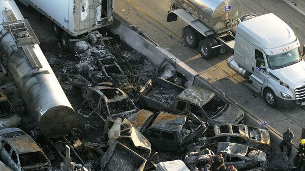 Crews clear wreckage after ‘superfog’ pile-ups leave at least seven dead