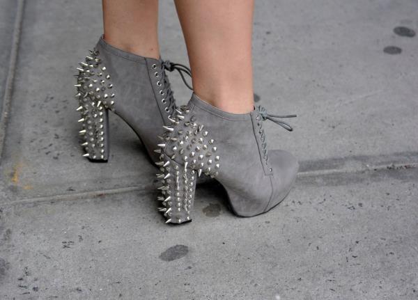 Fashion editor Michelle Christina in spiked grey Jeffrey Campbell shoes outside the Jenny Lai show at Spring 2013 New York Fashion Week