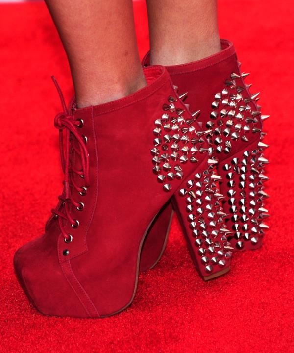 Singer Megan Mace showcasing red spiked shoes at the 2012 iHeartRadio Music Festival press room, MGM Grand Garden Arena, Las Vegas.